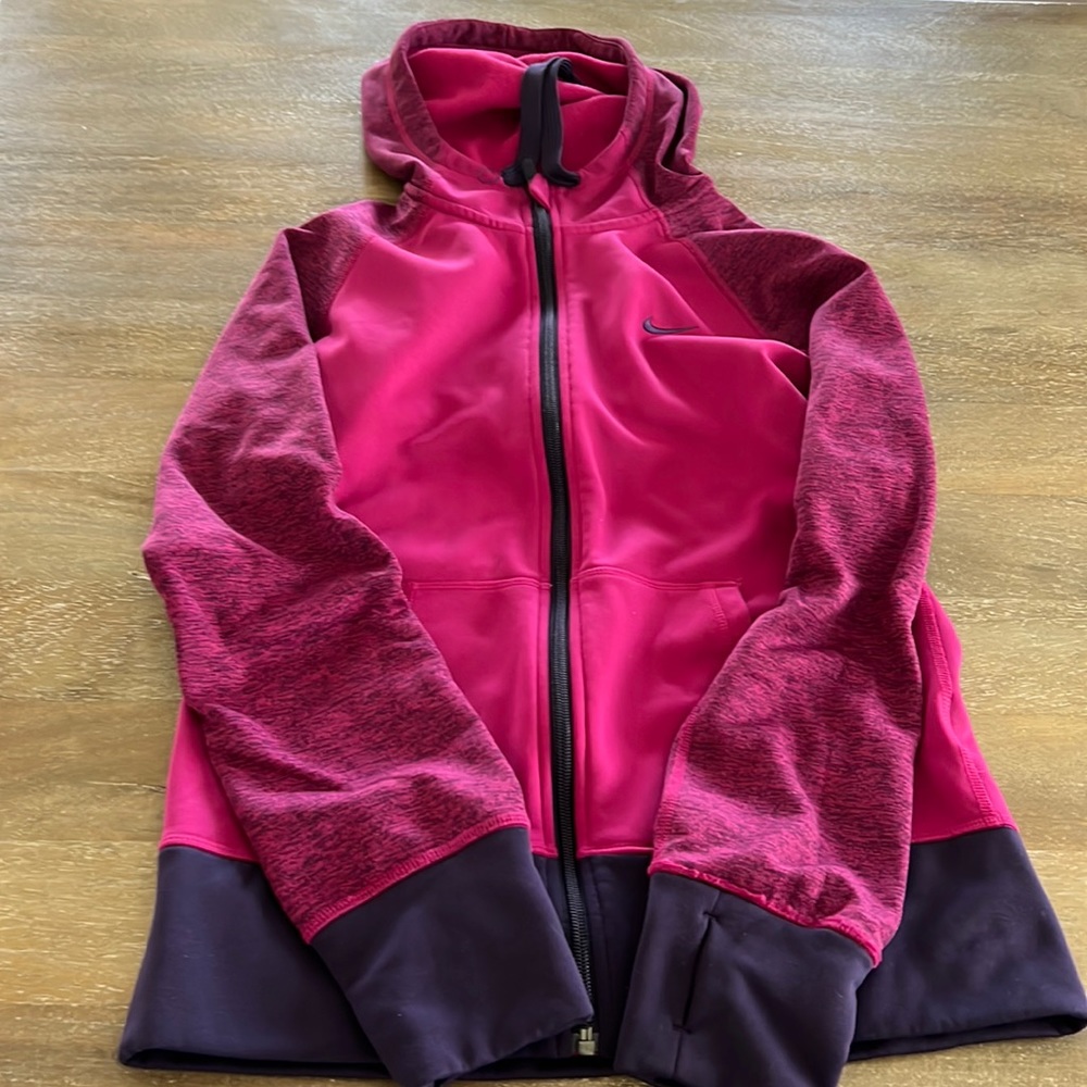 Women Nike zip up sweater. Size small. Color pink